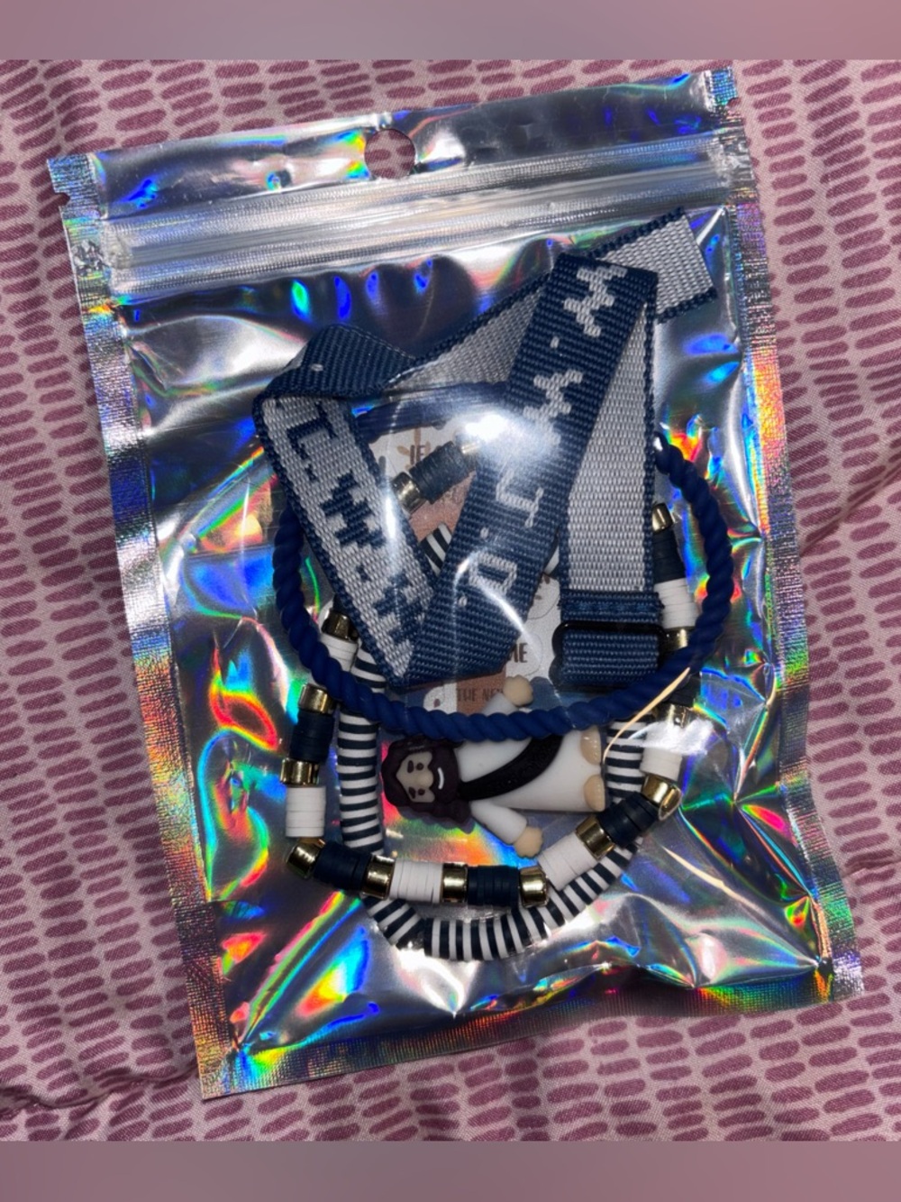 4 piece bracelet set, 1 tiny Jesus,
2 stickers-navy blue